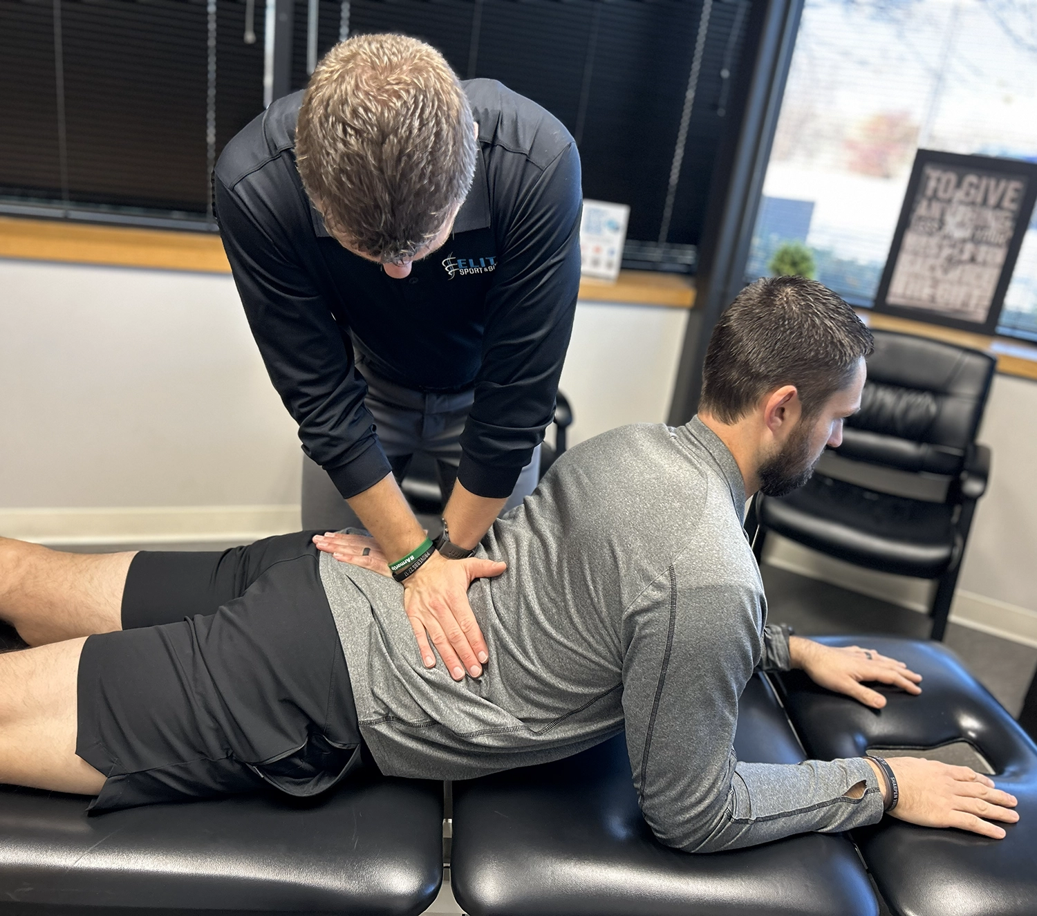 Dr. Zach Shiels showcasing the McKenzie Method on patient